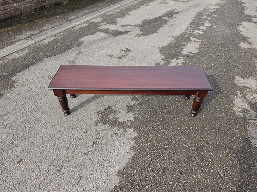 Long mahogany coloured low - coloured,